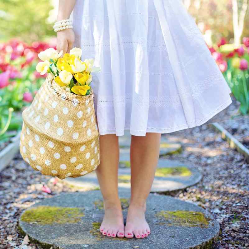 Female gardener with bare feet